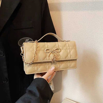 Bolso acolchado con lazo