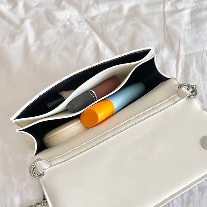 Bolso acolchado con lazo