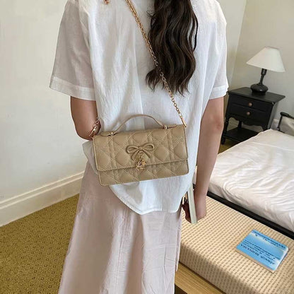 Bolso acolchado con lazo